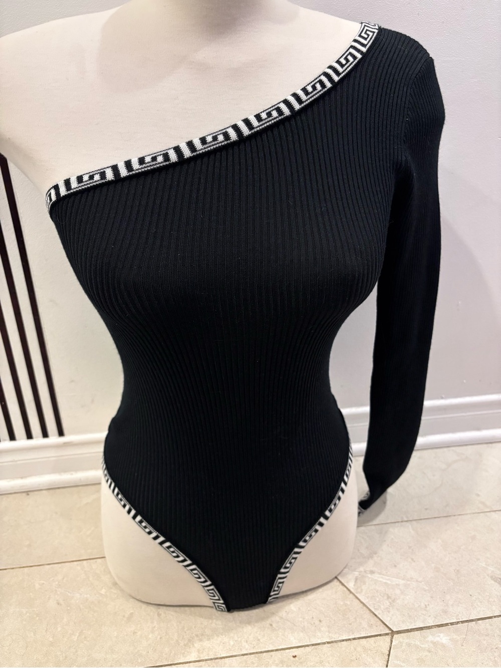 One-Shoulder Black Ribbed Bodysuit with White Geometric Trim